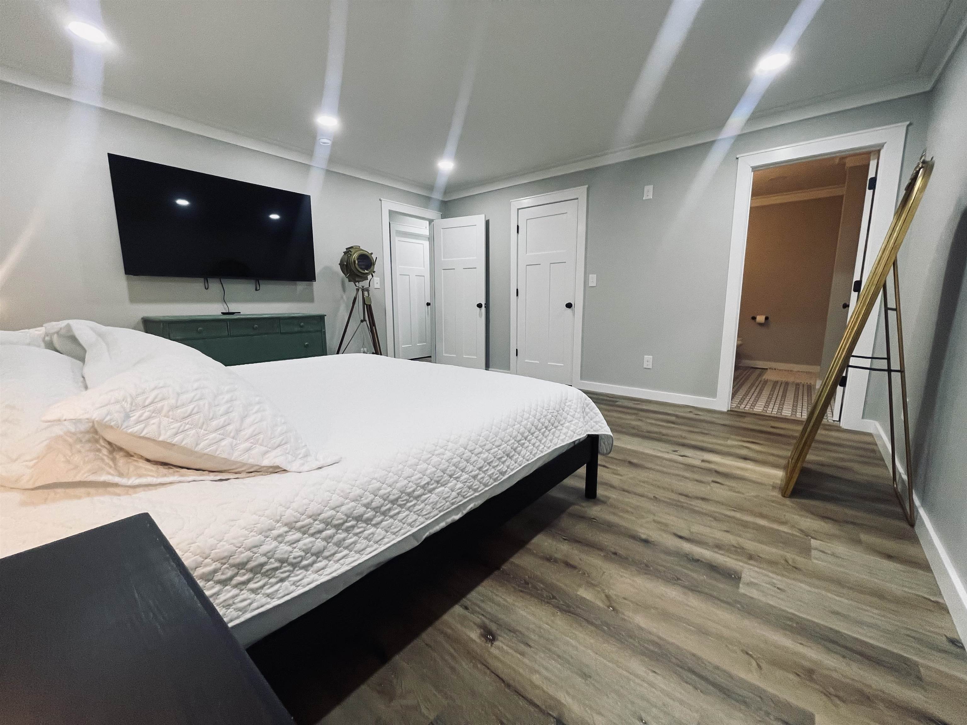 135 West 3rd Street Henderson, TN 38340 - Photo 17 of 31 Bedroom with ornamental molding and wood finished floors