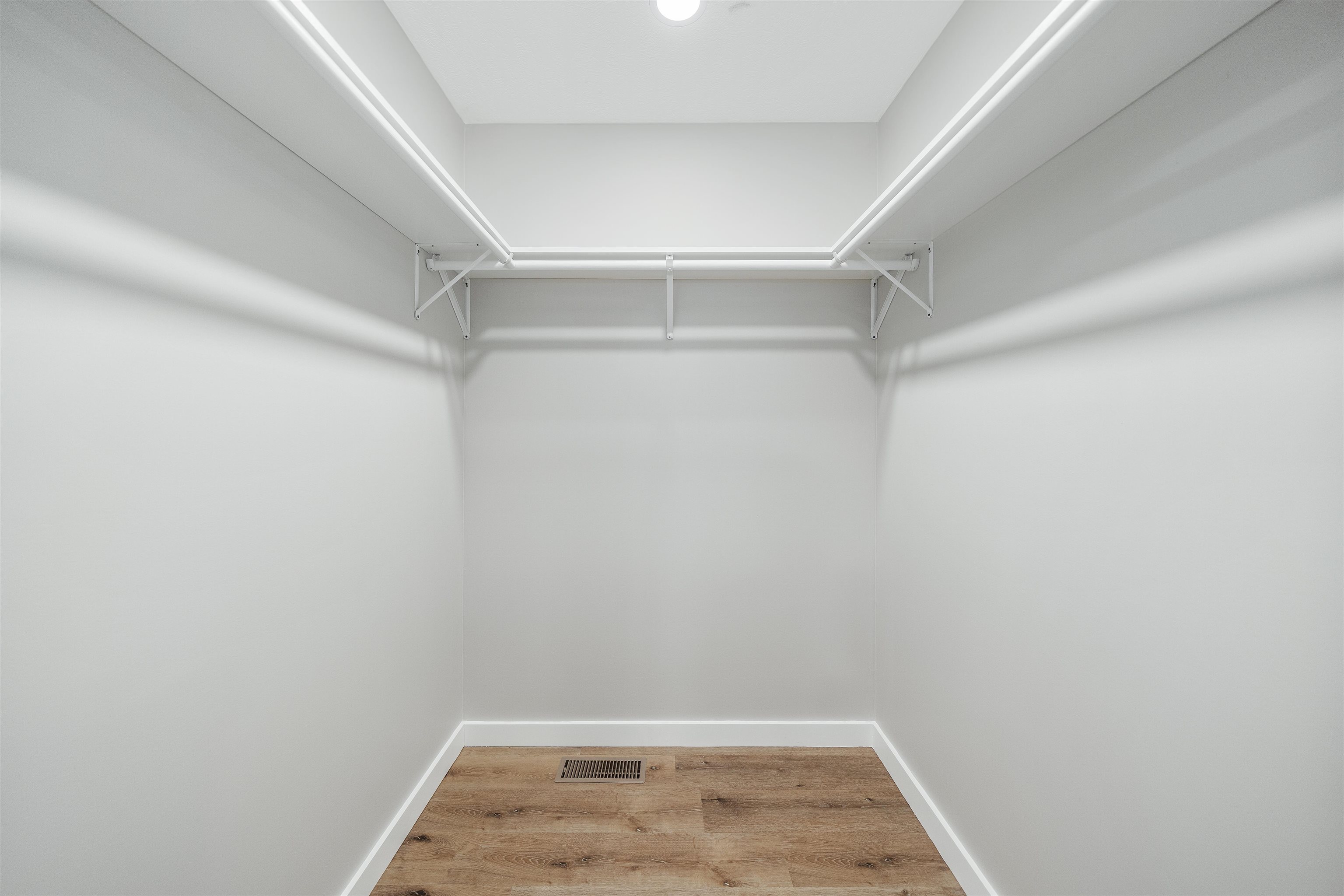 135 West 3rd Street Henderson, TN 38340 - Photo 3 of 31 Walk in closet featuring light wood-style floors