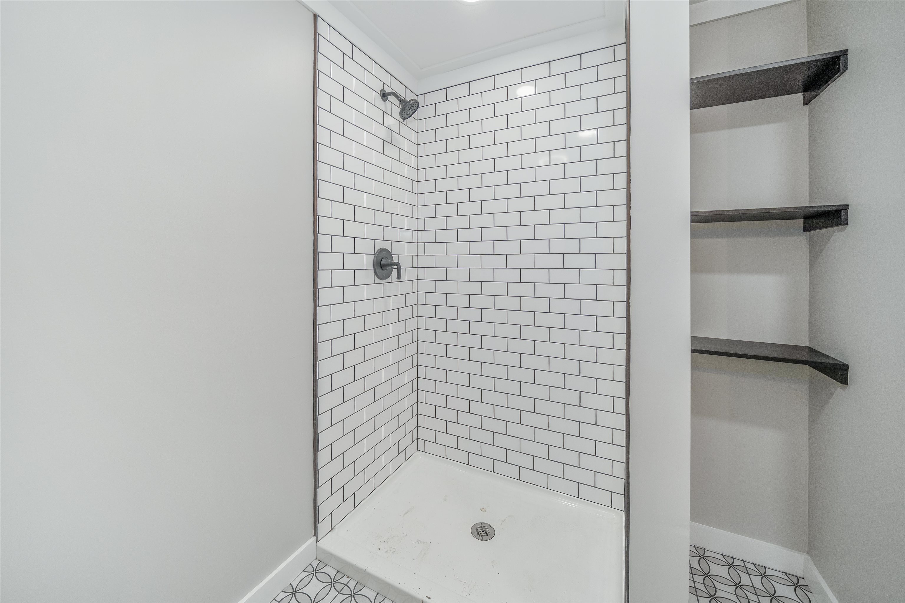 135 West 3rd Street Henderson, TN 38340 - Photo 5 of 31 Bathroom with baseboards and a shower stall