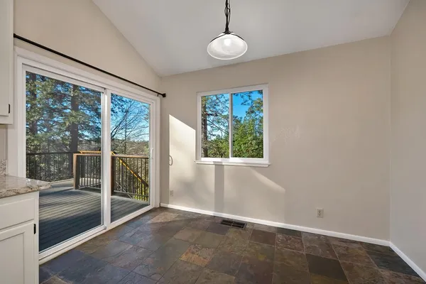 an empty room with windows