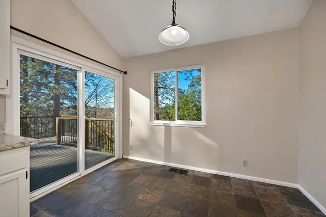 an empty room with windows