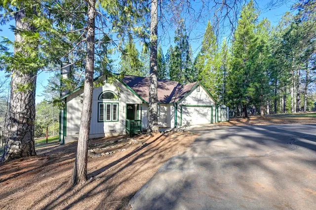 a house with trees in front of it