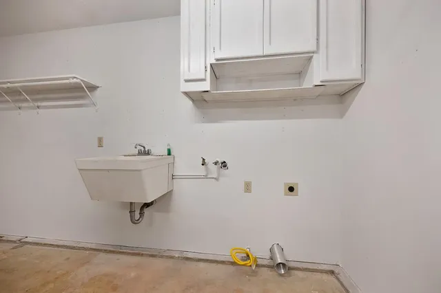 a bathroom with a sink and a shower