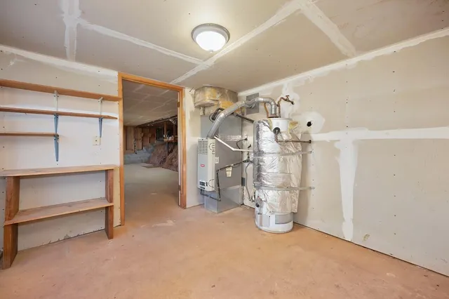 a view of a room with gym equipment and entryway