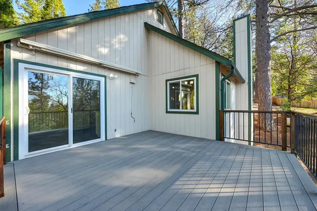 a backyard of a house with seating space