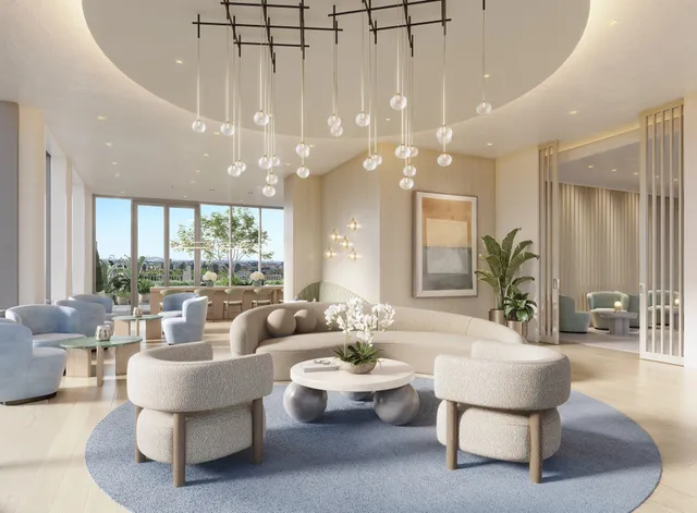 a living room with furniture and a large glass walk in closet