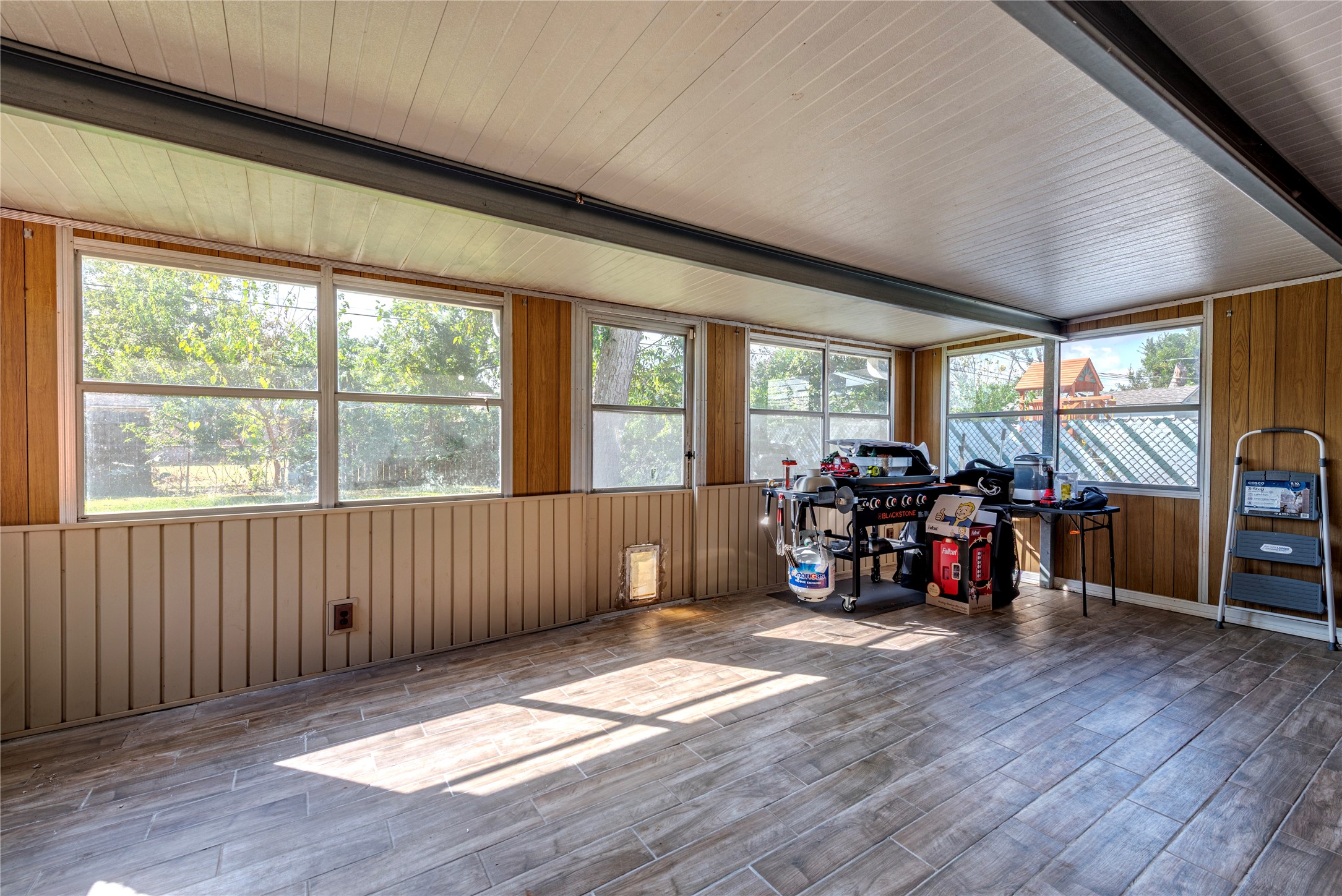 10526 Tolman Street Houston, TX 77034 - Photo 20 of 22 a view of a room with wooden floor and furniture