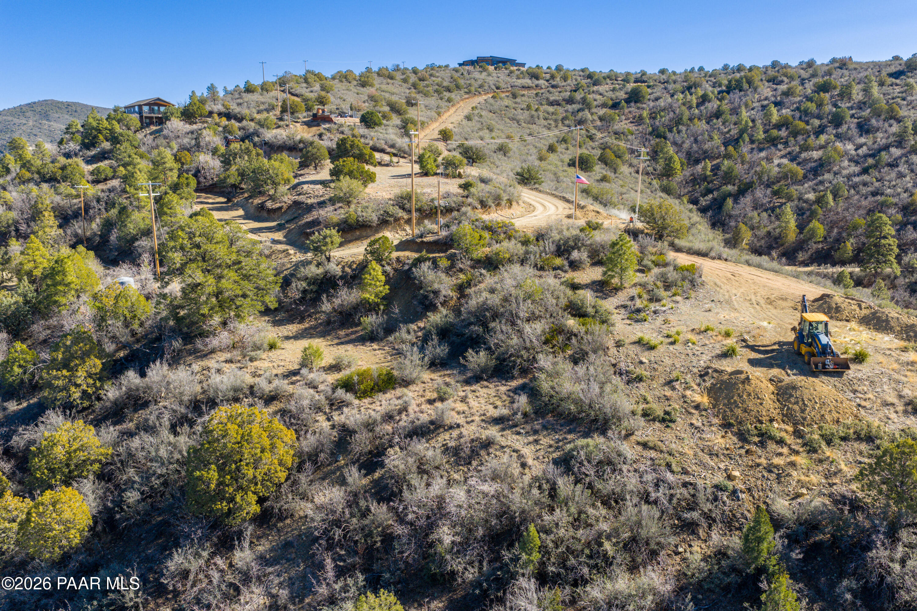 1490 South Rattlesnake Way Prescott, AZ 86303 - Photo 15 of 24 a view of a forest with a building