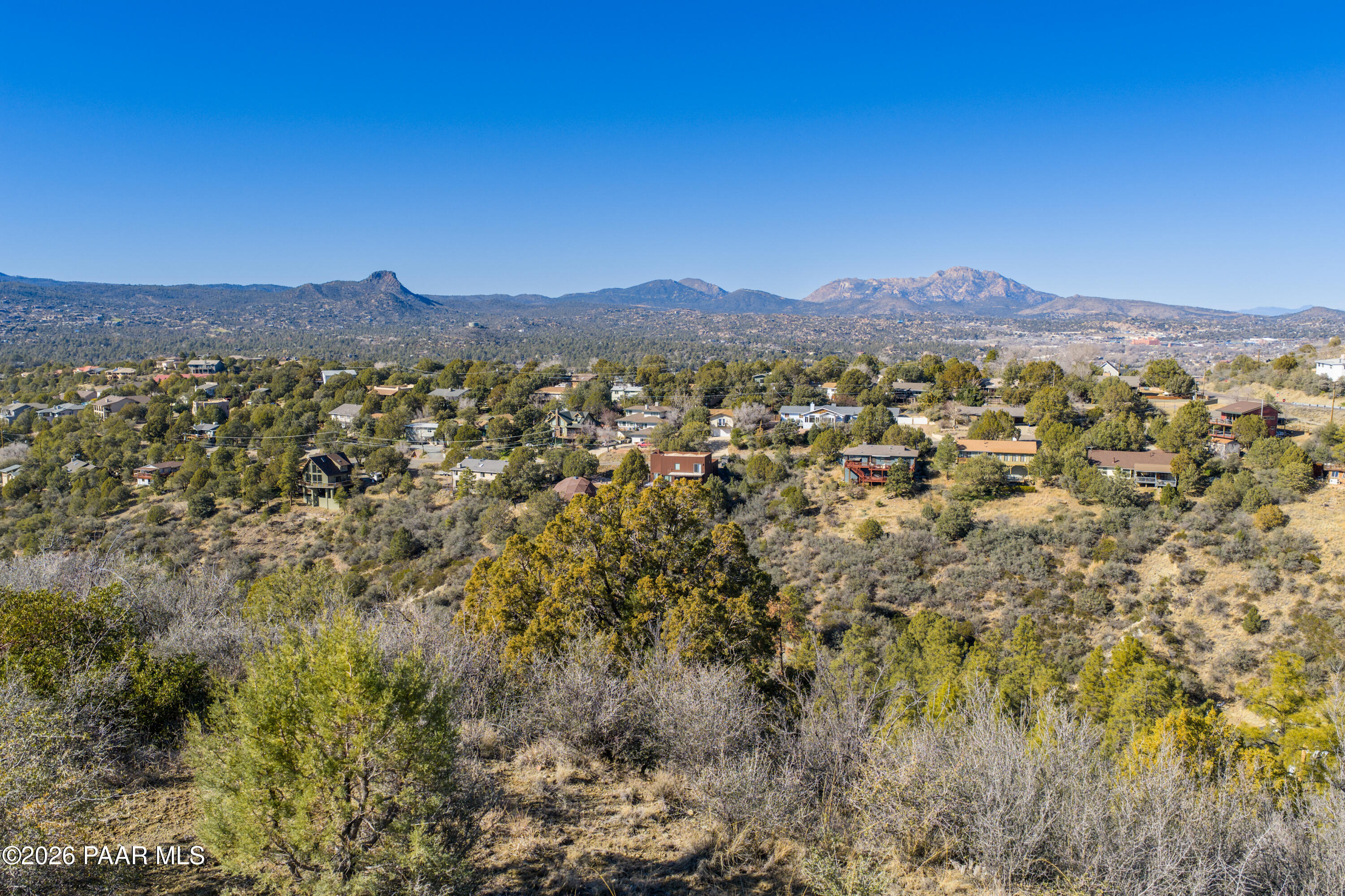 1490 South Rattlesnake Way Prescott, AZ 86303 - Photo 19 of 24 a view of a city with a mountain in the background