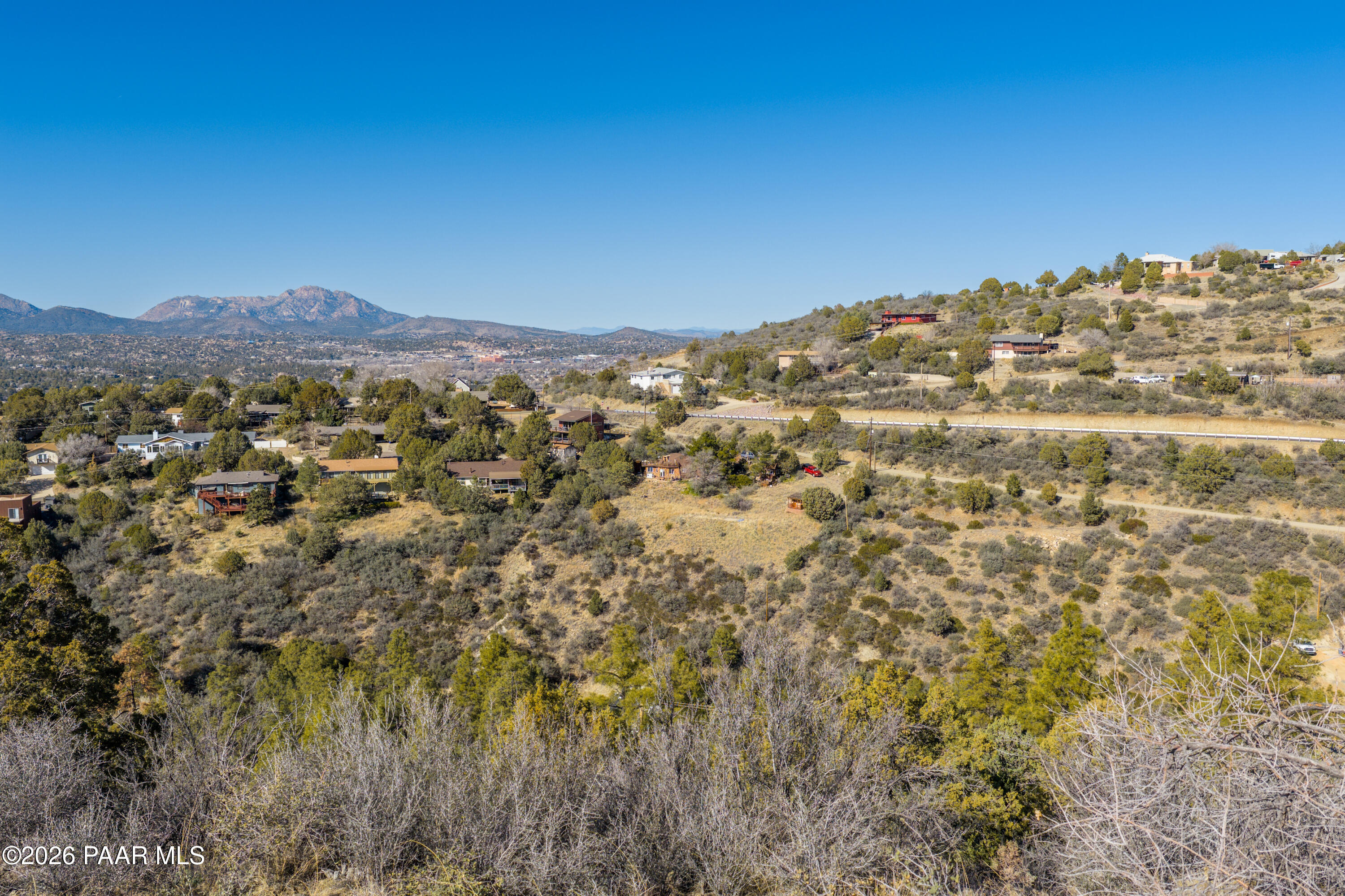 1490 South Rattlesnake Way Prescott, AZ 86303 - Photo 20 of 24 a view of a large mountain with mountains in the background
