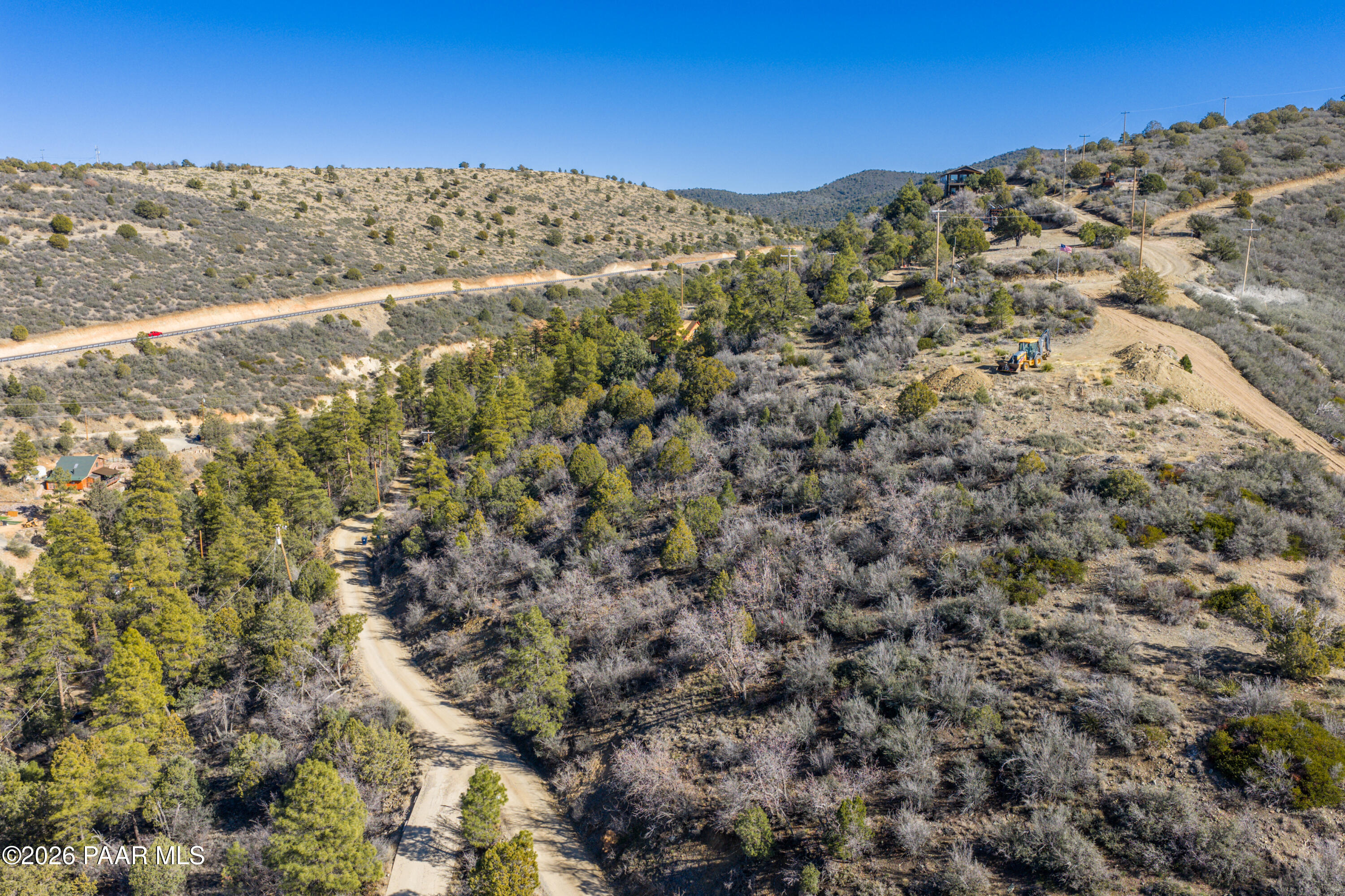 1490 South Rattlesnake Way Prescott, AZ 86303 - Photo 7 of 24 a view of a field with mountains in the background