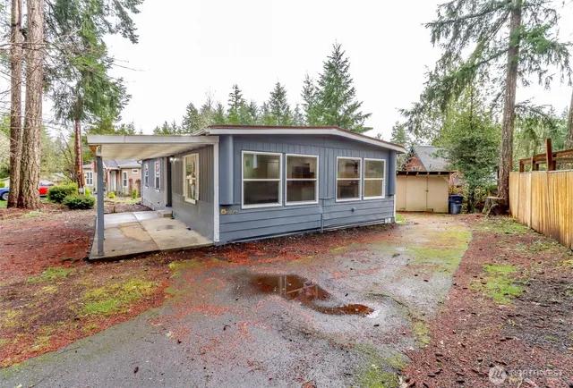 front view of a house with a yard