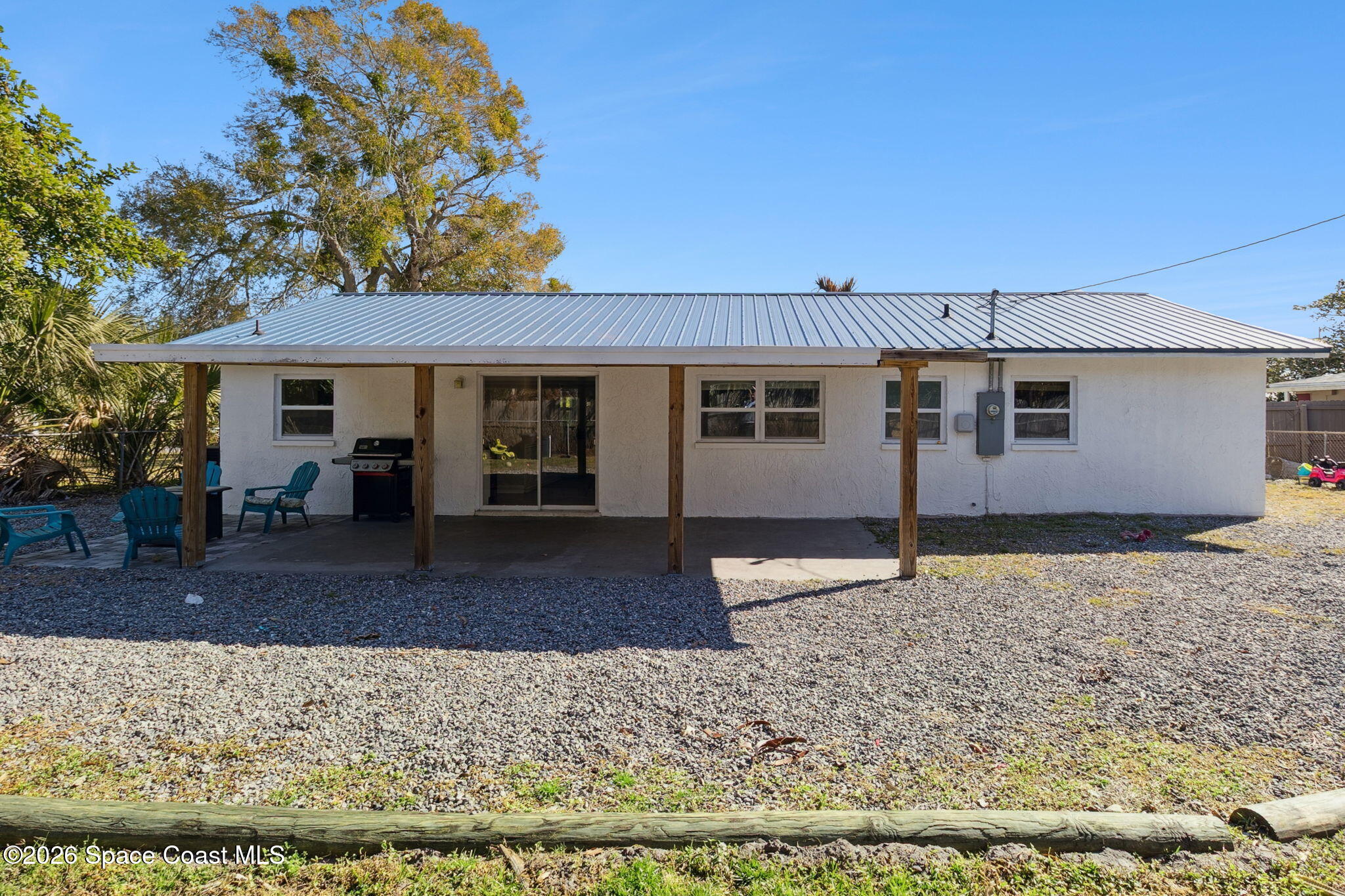 207 2nd Street Merritt Island, FL 32953 - Photo 17 of 19 front view of a house with a yard