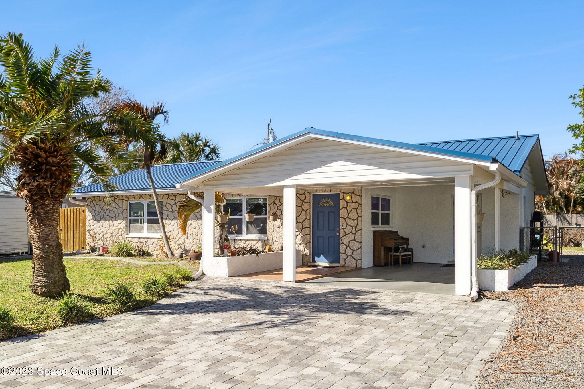 207 2nd Street Merritt Island, FL 32953 - Photo 18 of 19 a view of a house with a outdoor space