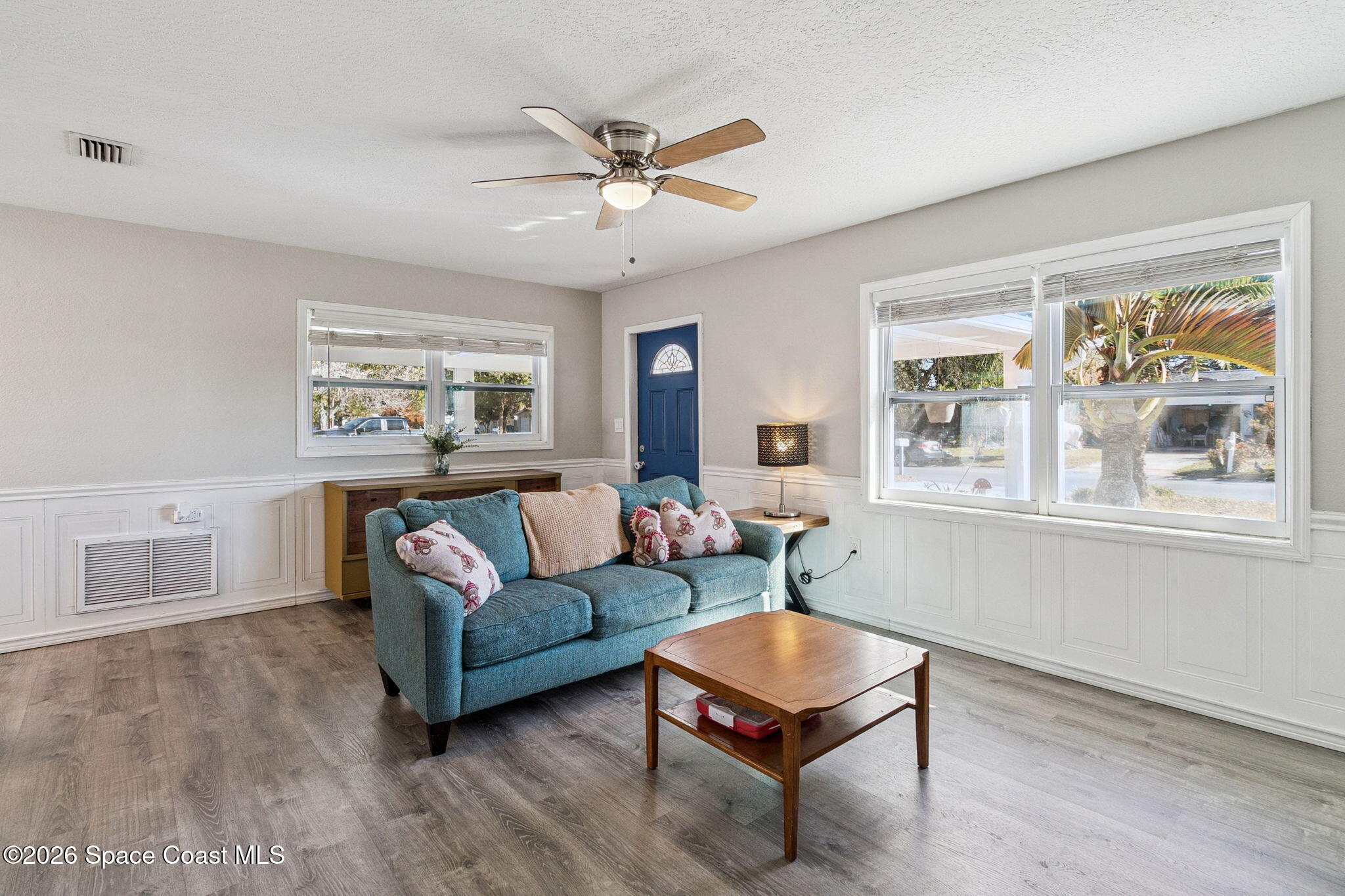 207 2nd Street Merritt Island, FL 32953 - Photo 3 of 19 a living room with furniture and a window