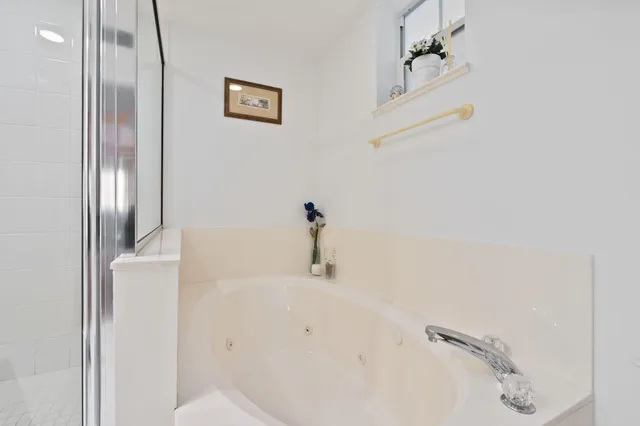 a bathroom with a bathtub