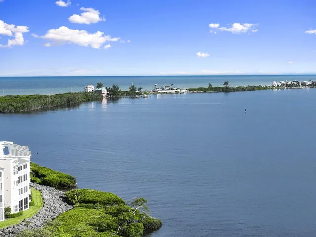 a view of a lake and sunset