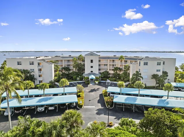 a terrace with outdoor seating and city view