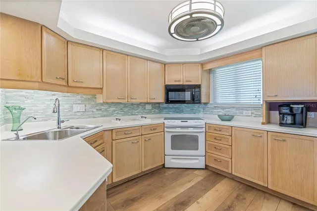 a view of a lake with a building in the background