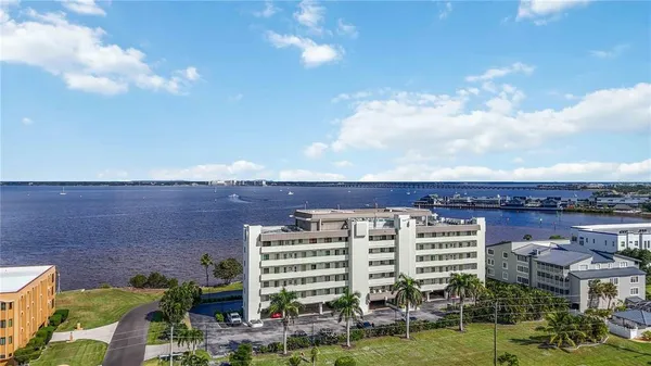 a view of city with ocean
