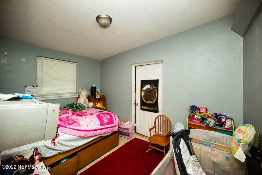 6836 Morgana Road North Jacksonville, FL 32211 - Photo 12 of 15 a room with furniture and a table
