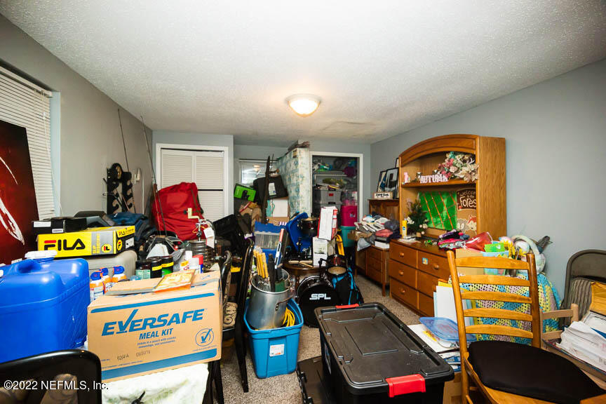 6836 Morgana Road North Jacksonville, FL 32211 - Photo 13 of 15 a view of a room with gym equipment