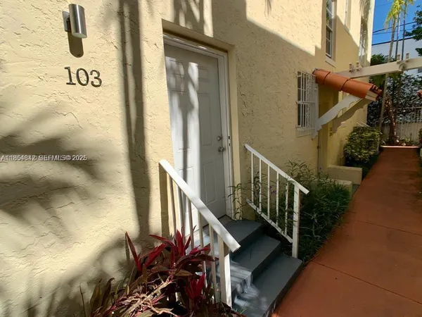 a view of a house with a street