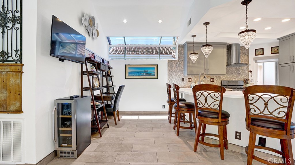 24965 Seagate Drive Dana Point, CA 92629 - Photo 13 of 44 Bar seating provides in-kitchen dining.