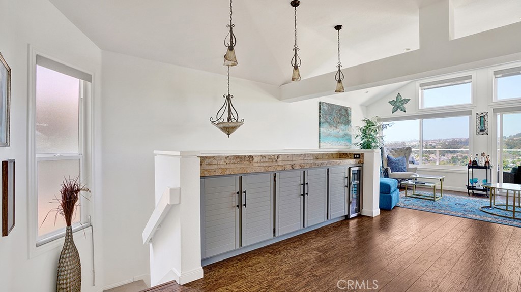 24965 Seagate Drive Dana Point, CA 92629 - Photo 16 of 44 Built-in cabinet for serve ware and wine fridge.