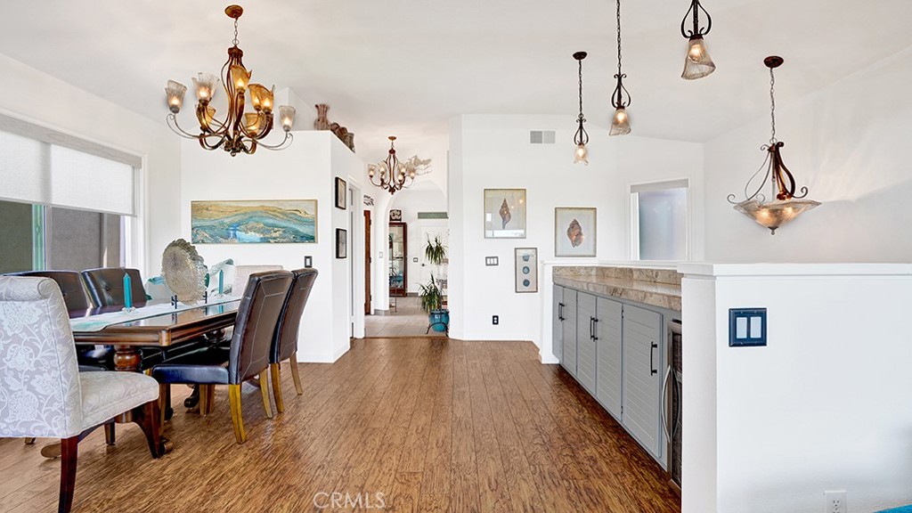 24965 Seagate Drive Dana Point, CA 92629 - Photo 19 of 44 Dining Area opposite built-in serve ware cabinets and wine fridge.