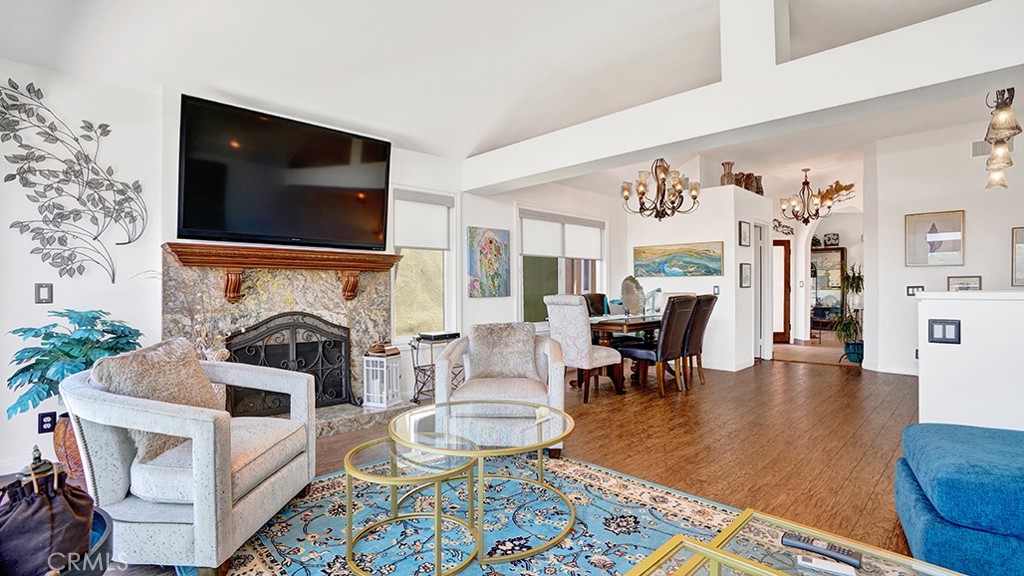 24965 Seagate Drive Dana Point, CA 92629 - Photo 20 of 44 Living room is the perfect sanctuary for taking in the views or enjoying the fireplace