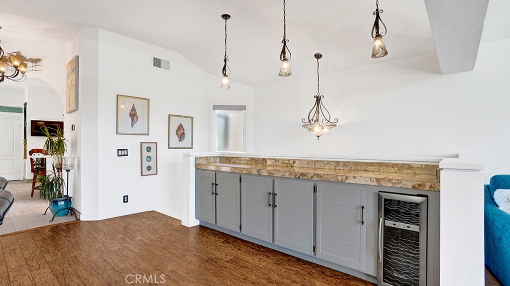 24965 Seagate Drive Dana Point, CA 92629 - Photo 22 of 44 Built-in cabinet for serve ware and wine fridge.