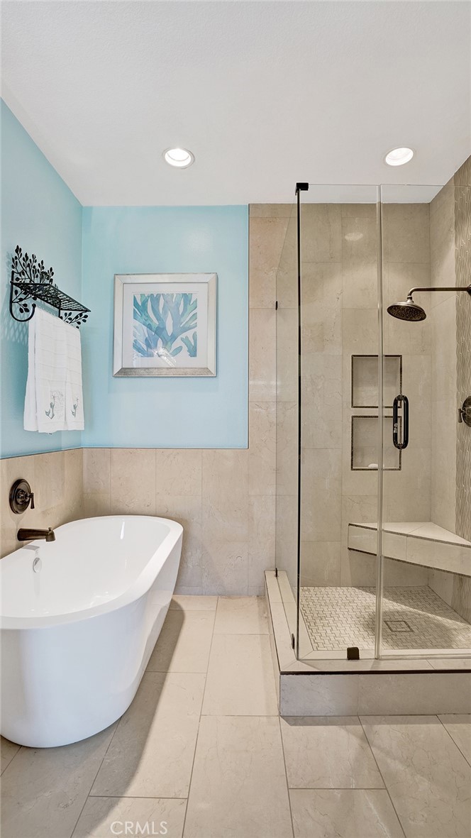 24965 Seagate Drive Dana Point, CA 92629 - Photo 33 of 44 Master Bathroom - Features freestanding tub and tile surround walls.