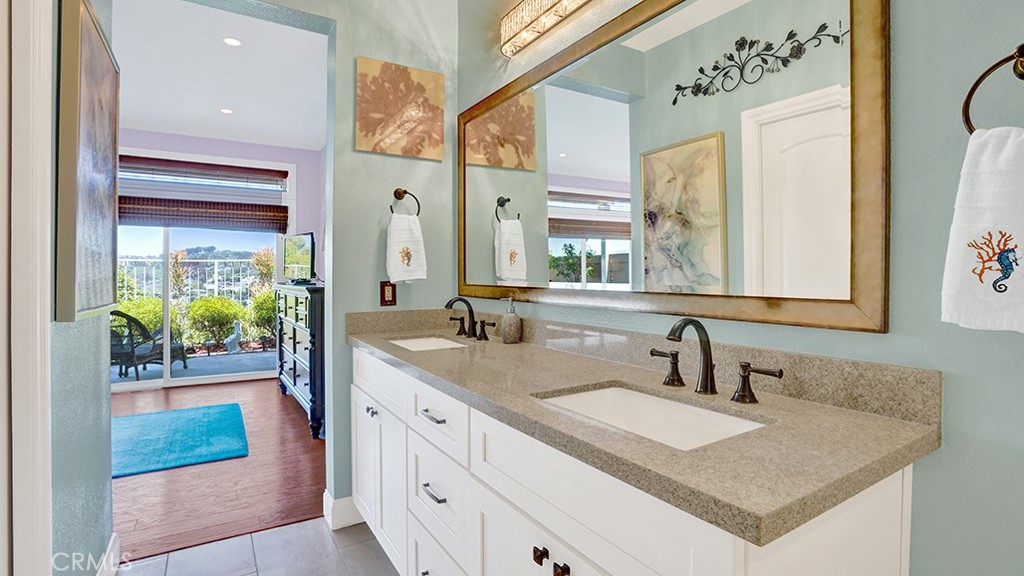 24965 Seagate Drive Dana Point, CA 92629 - Photo 35 of 44 Master Bathroom - Includes New Dual Sink Vanity with quartz counter and tile flooring.