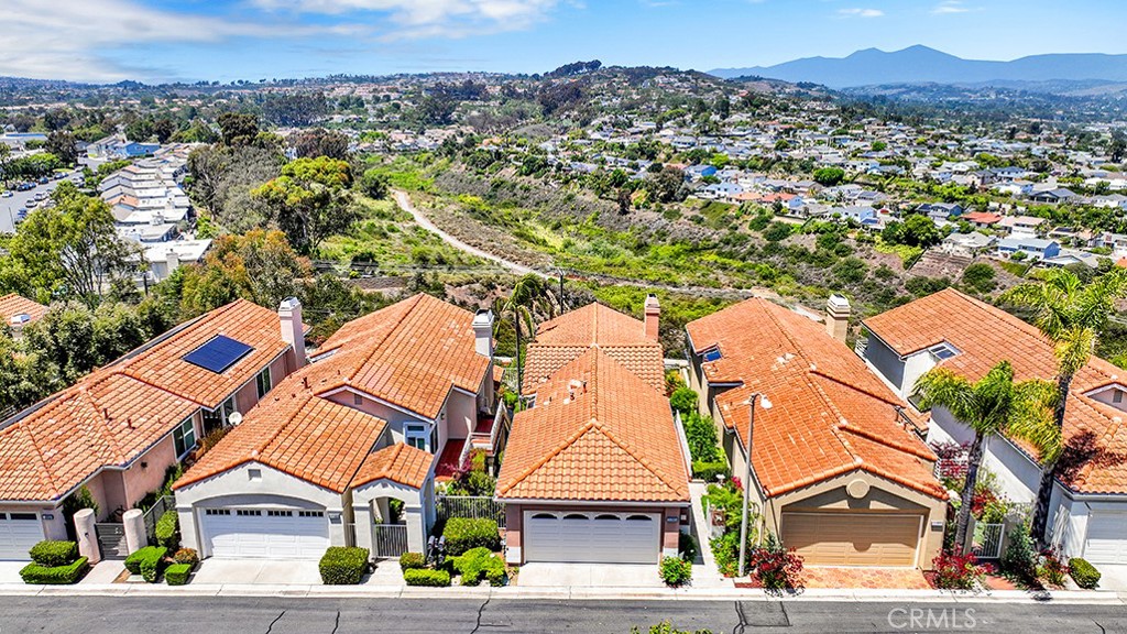 24965 Seagate Drive Dana Point, CA 92629 - Photo 4 of 44 No homes directly behind provide beautiful panoramic views off living room.
