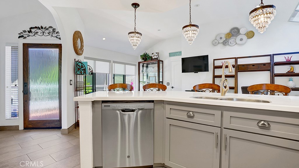 24965 Seagate Drive Dana Point, CA 92629 - Photo 10 of 44 Enter into entertainment floor with kitchen, dining, and living room with panoramic view.