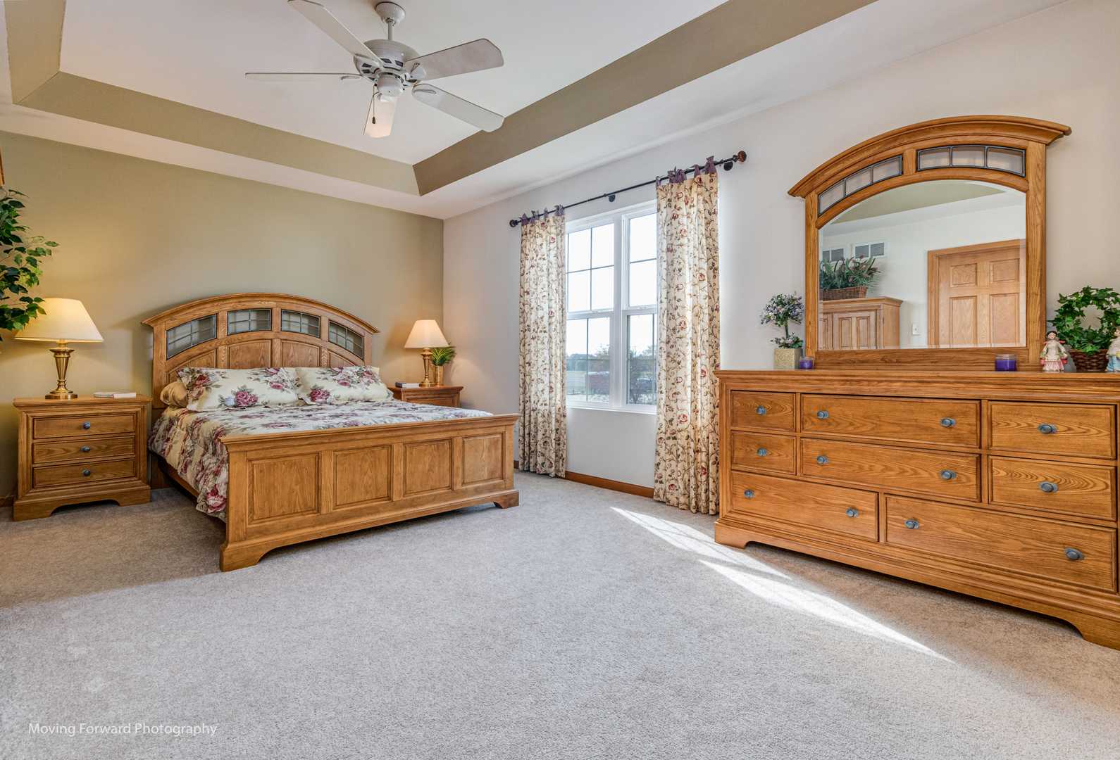 1909 Eagle Drive Morris, IL 60450 - Photo 13 of 24 a bedroom with a bed a dresser and large mirror