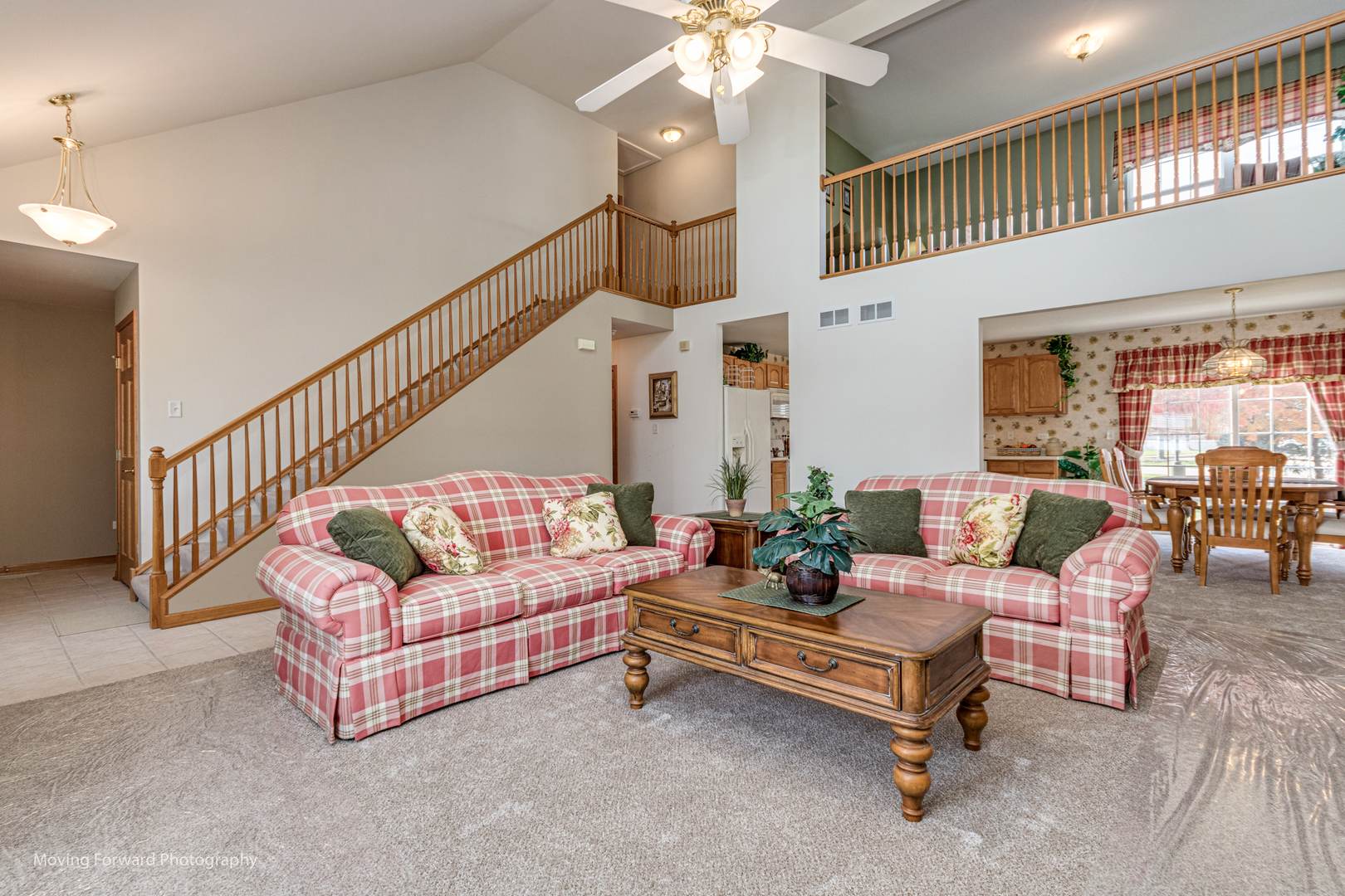 1909 Eagle Drive Morris, IL 60450 - Photo 6 of 24 a living room with furniture and a chandelier