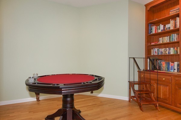 69 Wayside Road, Unit 69 Concord, MA 01742 - Photo 8 of 22 a view of a room with furniture and wooden floor