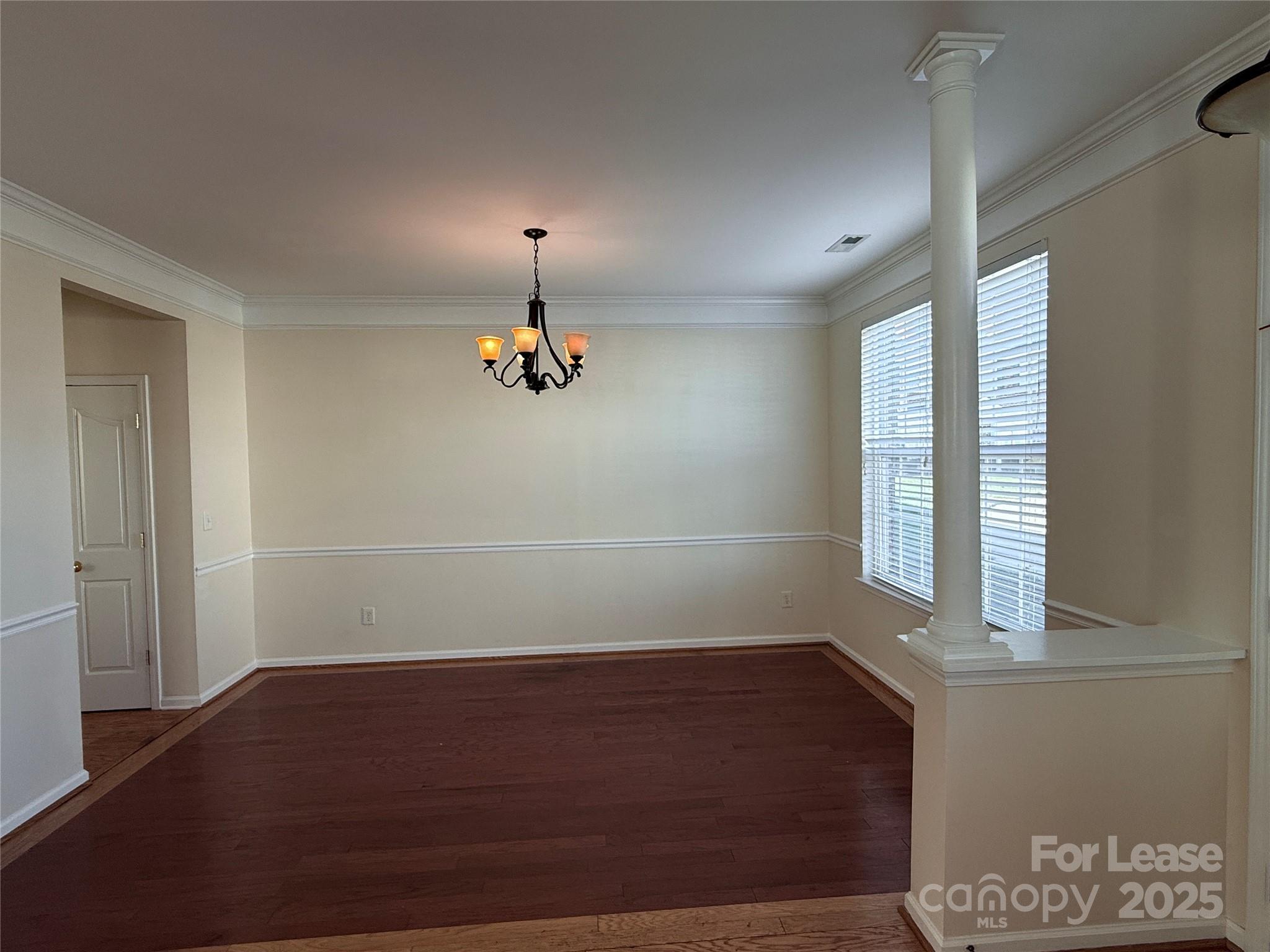7549 Bluff Point Lane Denver, NC 28037 - Photo 7 of 18 an empty room with a empty space and windows