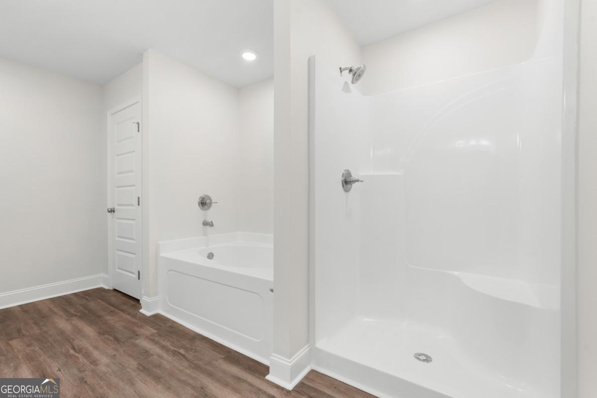 909 Ryegrass Road, Unit 81 Statesboro, GA 30458 - Photo 11 of 23 a bathroom with a bathtub and shower