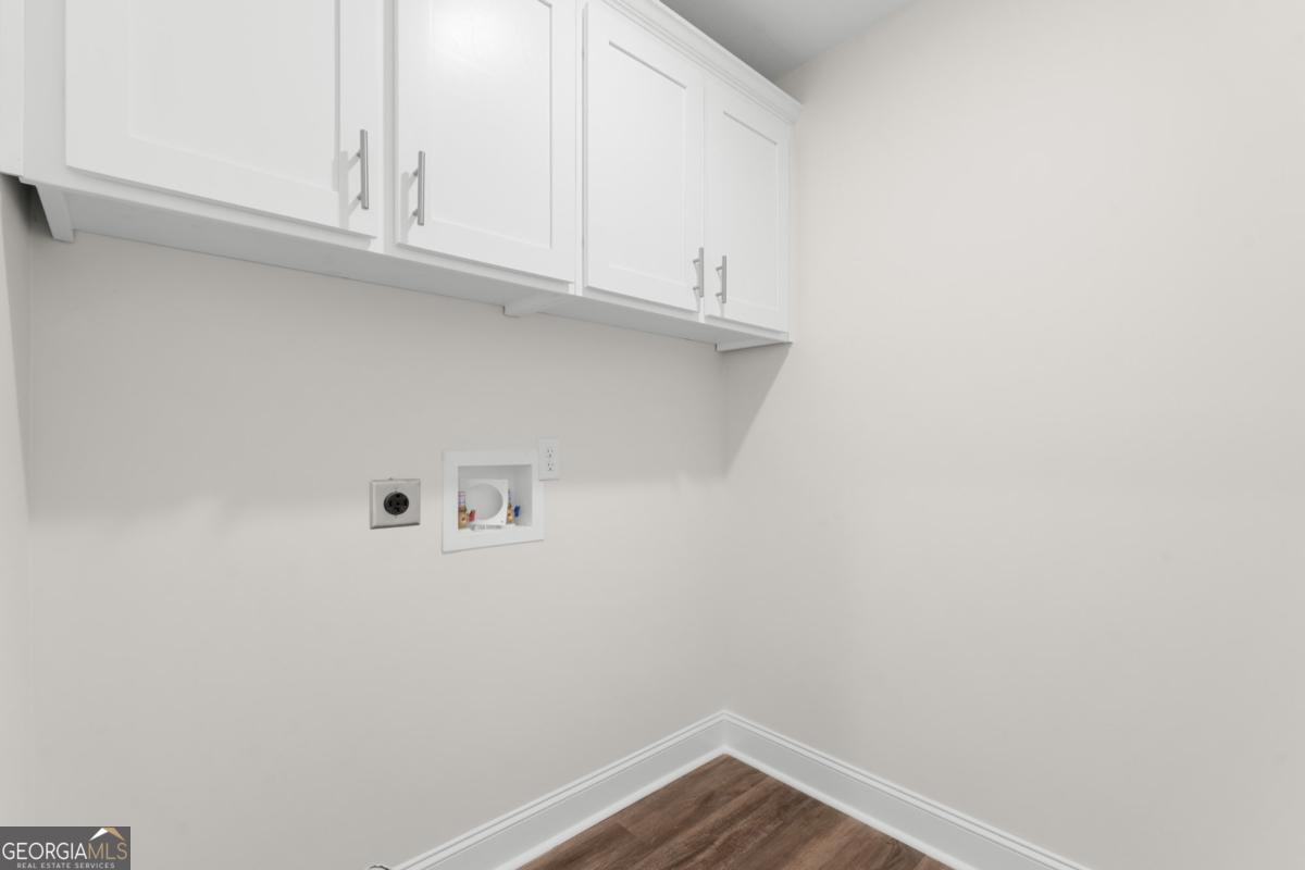909 Ryegrass Road, Unit 81 Statesboro, GA 30458 - Photo 17 of 23 a view of a kitchen with white cabinets