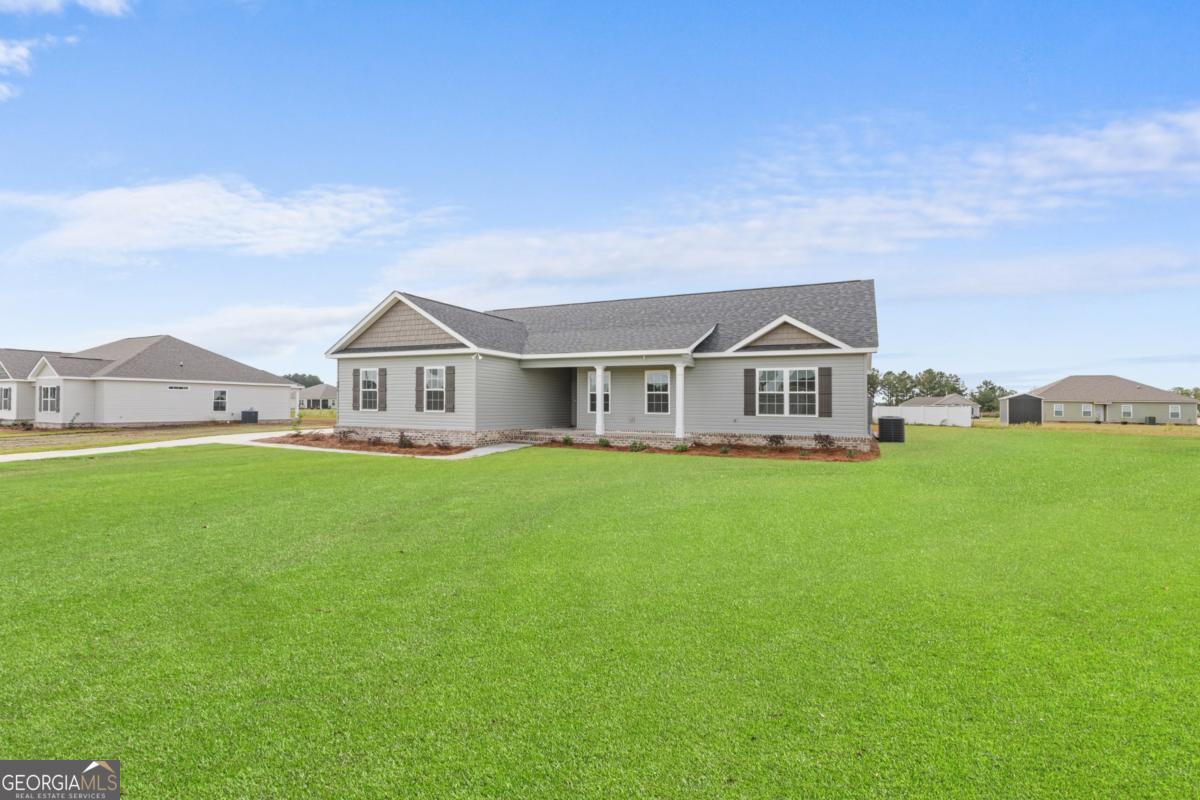 909 Ryegrass Road, Unit 81 Statesboro, GA 30458 - Photo 18 of 23 a view of outdoor space yard and front view of house