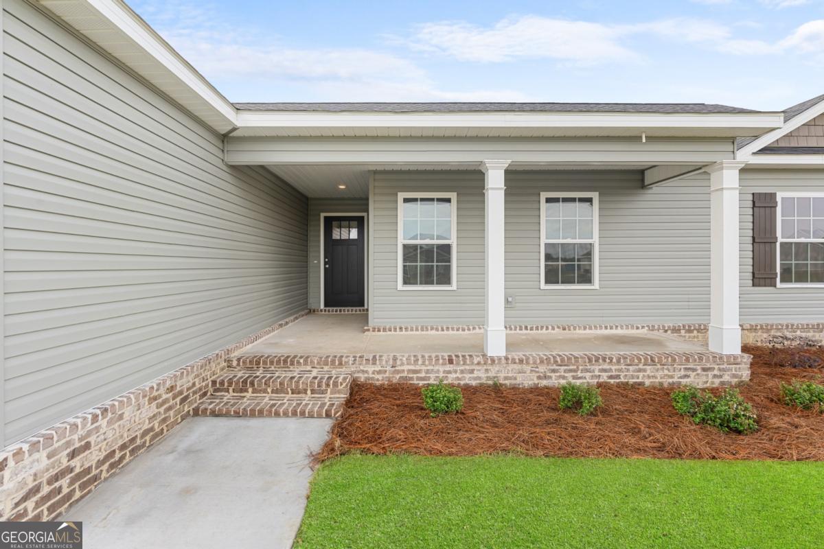 909 Ryegrass Road, Unit 81 Statesboro, GA 30458 - Photo 20 of 23 a front view of a house
