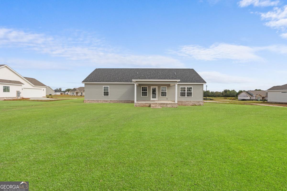 909 Ryegrass Road, Unit 81 Statesboro, GA 30458 - Photo 21 of 23 a front view of house with yard