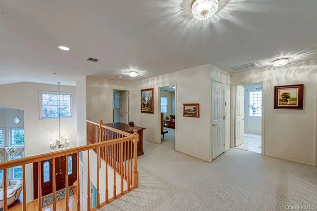 a view of a hallway with workspace