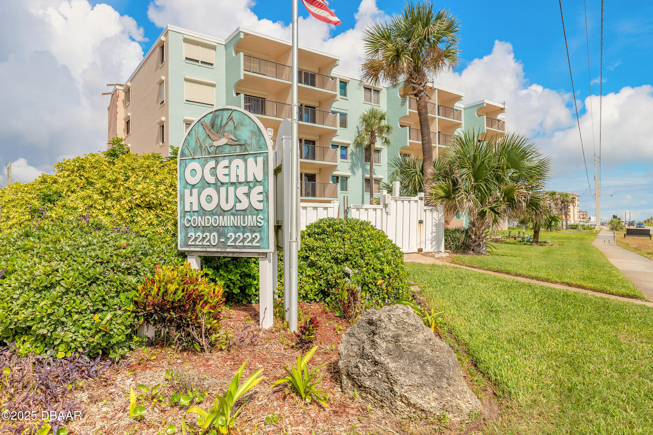2222 Ocean Shore Boulevard, Unit 402B Ormond Beach, FL 32176 - Photo 1 of 31 a sign on the side of the road