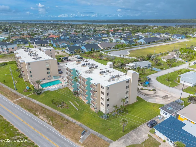 a kitchen with a refrigerator a sink and dishwasher