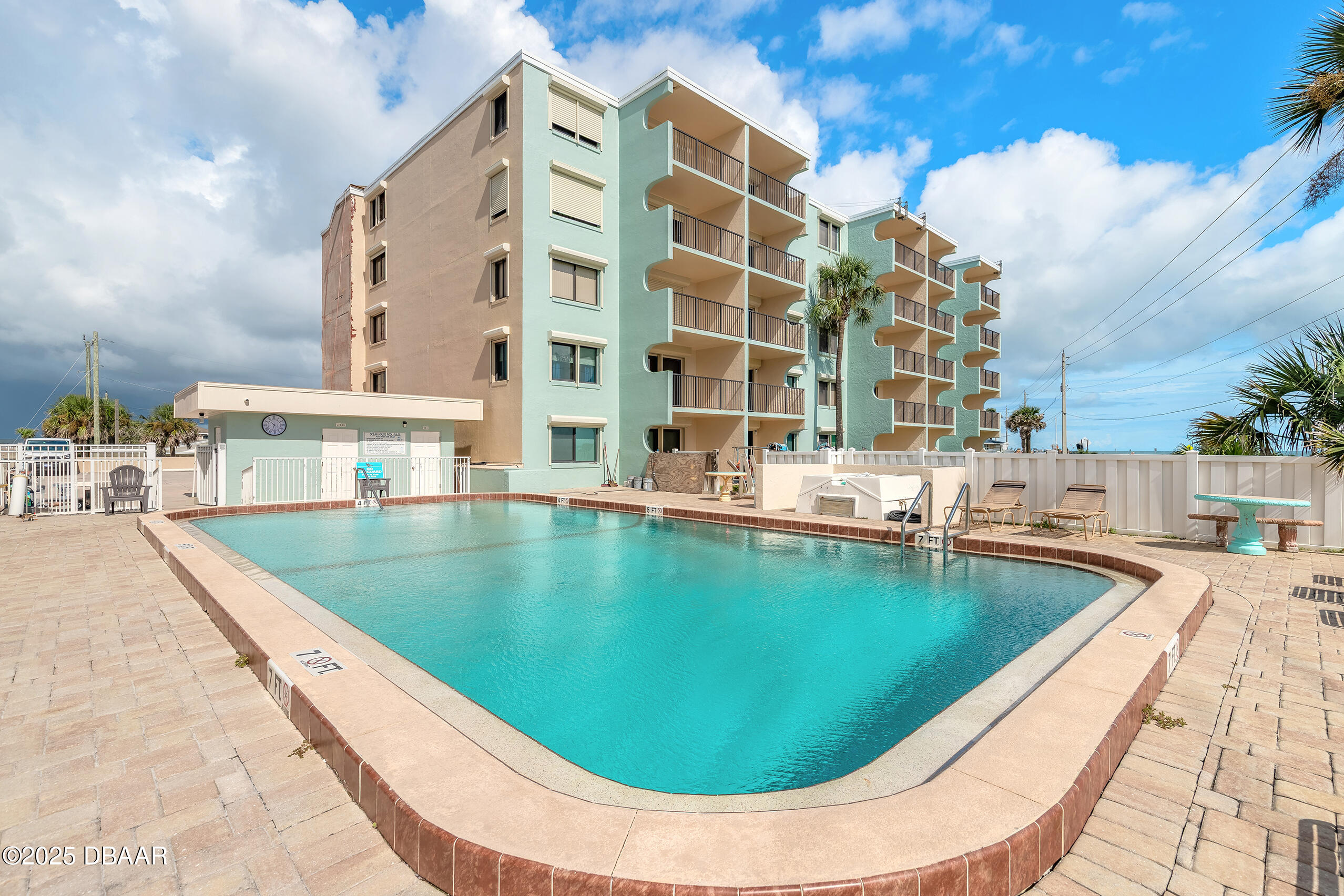 2222 Ocean Shore Boulevard, Unit 402B Ormond Beach, FL 32176 - Photo 4 of 31 a view of swimming pool with outdoor seating