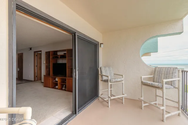 a view of room with furniture and closet